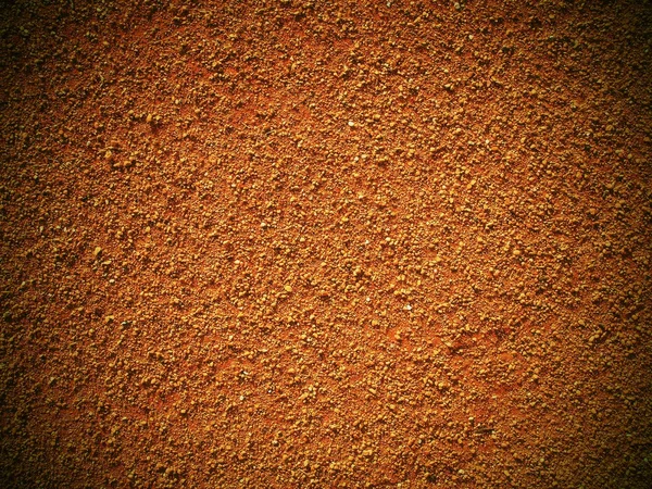 Dry light red crushed bricks surface on outdoor tennis ground. Detail of texture — Stock Photo, Image