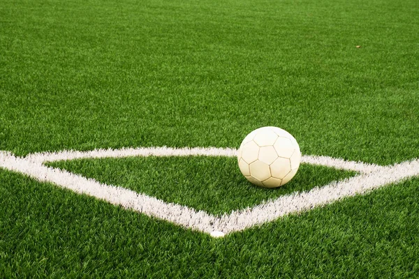 Ball prepared for corner kick. Heated football playground. corner on artificial green turf ground with painted white line marks. — Stock Photo, Image