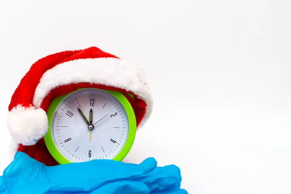 New Year Alarm Clock Santa Hat Rubber Gloves White Background — 스톡 사진