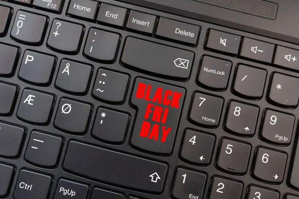Computer notebook keyboard inscriptions black friday on key. Black Friday e commerce concept.