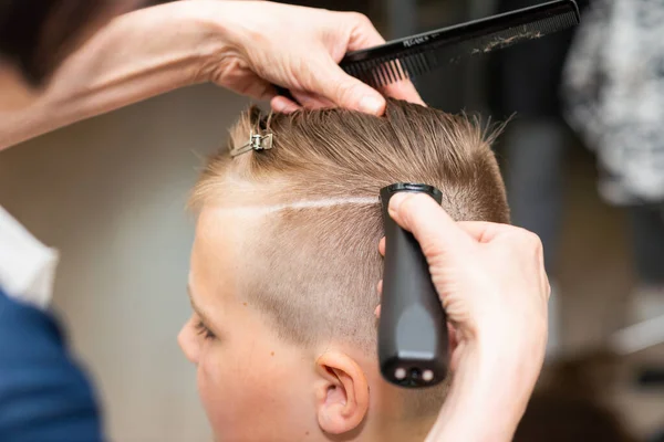 Hairdresser Makes Fashionable Pretty Hairstyle Young Boy Modern Barbershop Side — Stock Photo, Image