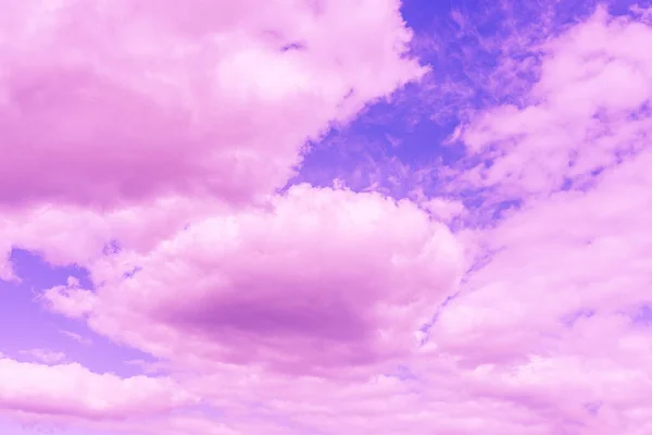 Beautiful dramatic pink cloud purple sky and violet filter Background.Toned.