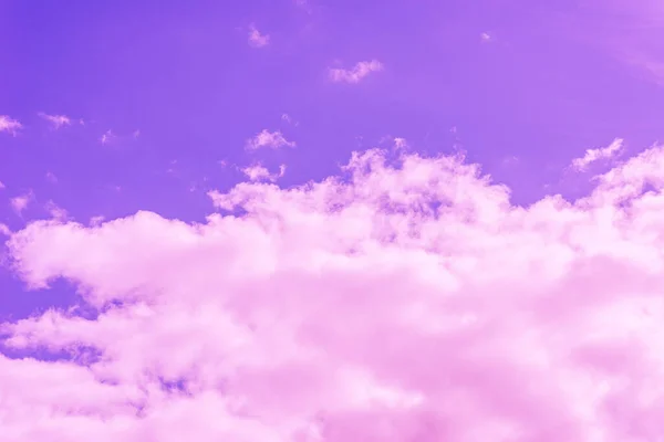 Beautiful dramatic pink cloud purple sky and violet filter Background.Toned.