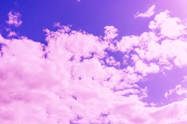Beautiful dramatic pink cloud purple sky and violet filter Background.Toned.
