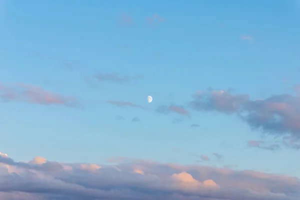 Purple and Pink Sky,moon and beautiful clouds with abstract colored background.Nice evening sky,cloud.