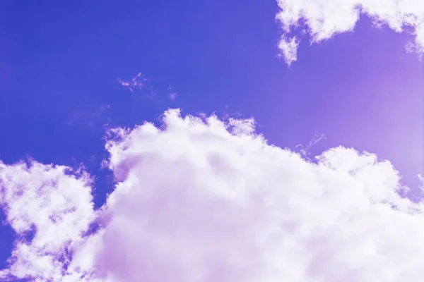 Purple clouds with beautiful blue sky,on the heaven.Amazing nature background.Toned.