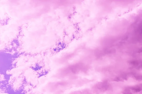 Beautiful dramatic pink cloud purple sky and violet filter Background.Toned.