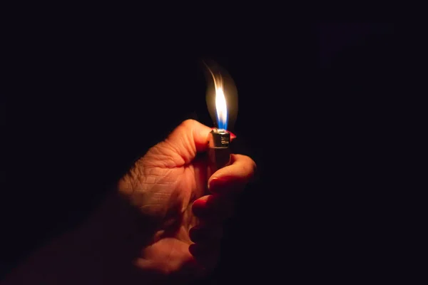 Woman Hand Holding Burning Lighter Dark Black Background Closeup Selective — Stock Photo, Image