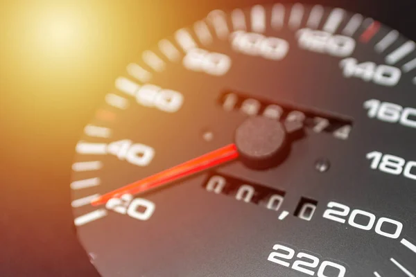 Speedometer in a car. Car dashboard. Dashboard details with indication lamps.Car instrument panel. Dashboard with speedometer.Car detailing. Modern interior.Closeup.Copy space.