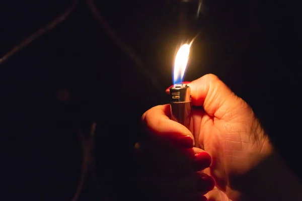 Woman Hand Holding Burning Lighter Dark Black Background Closeup Selective — Stock Photo, Image