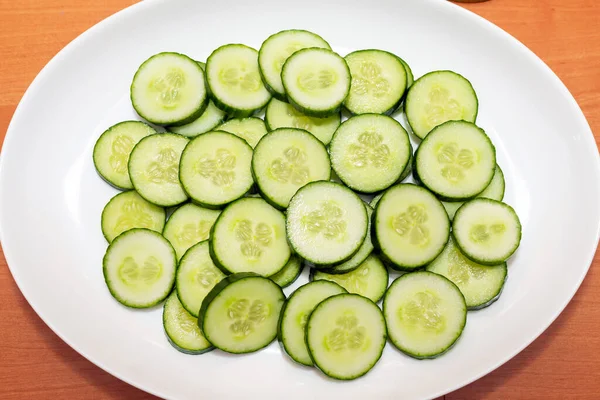 Sliced Oval Shape Fresh Cucumber Cucumis Sativus White Plate Top — Stock Photo, Image
