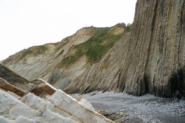 Zumaia 'nın sinekleri. Bask kıyıları, UNESCO tarafından Dünya Mirası ilan edildi. Dünya 'daki sineklerin arkeolojik oluşumları. 