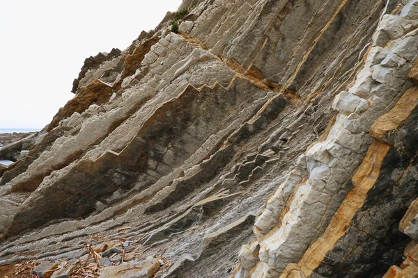 Zumaia Basque海岸的Flysches被联合国教科文组织宣布为世界遗产 地球上所谓飞碟的考古结构 — 图库照片