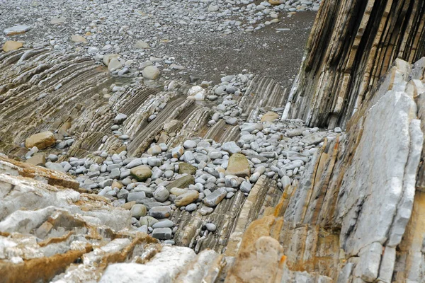 Zumaia Basque海岸的Flysches被联合国教科文组织宣布为世界遗产 地球上所谓飞碟的考古结构 — 图库照片