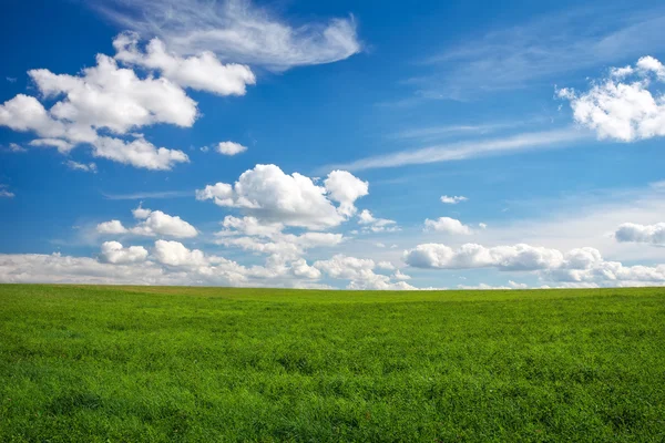 Nature landscape with sky, clouds, hills and grass — Stock Photo, Image