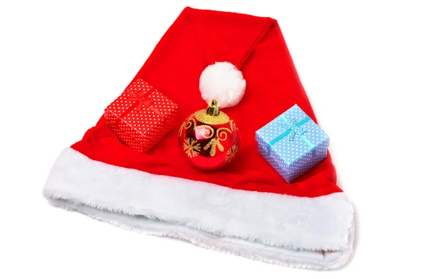 Jultomten röd och vit hatt, Leksak bubbla och jul present — Stockfoto