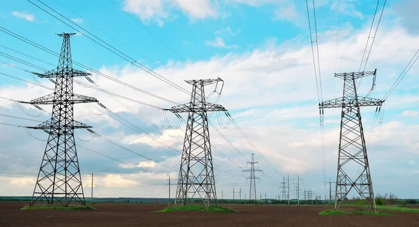 High Voltage Lines Power Pylons Flat Agricultural Landscape Sunny Day — Stock Photo, Image