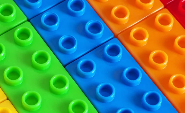 Giocattolo sfondo fatto di mattoni di plastica colorata — Foto Stock