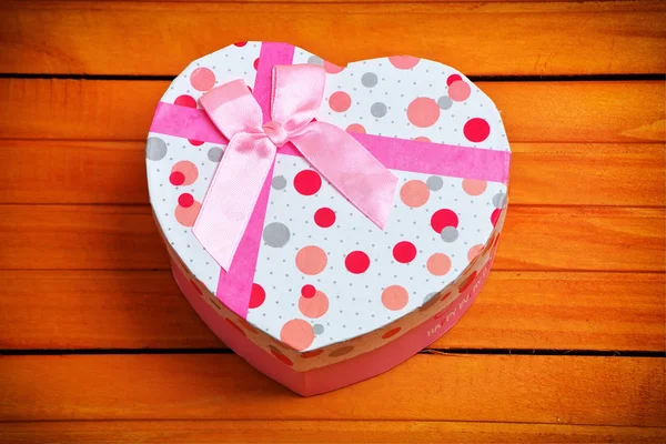 Heart shaped Valentines Day gift box on wooden background. Holid — Stock Photo, Image