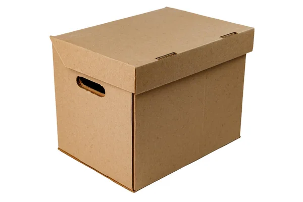 Empty cardboard box for storage. A closed brown box, isolated on a white background. view from the side — Stock Photo, Image