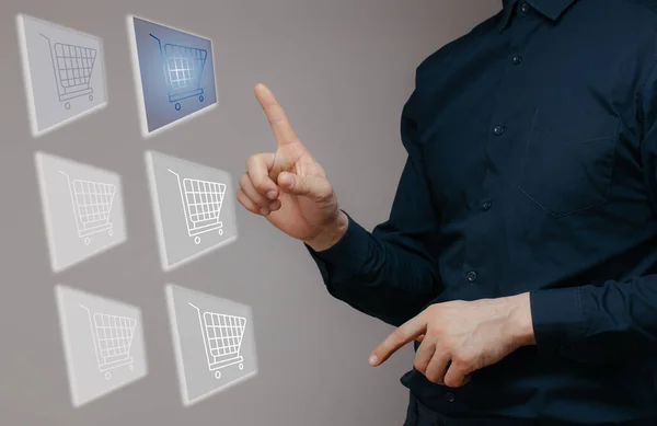 Businessman clicks the Add to Cart button on the virtual screens. concept of shopping in an online store, e-commerce — Stock Photo, Image