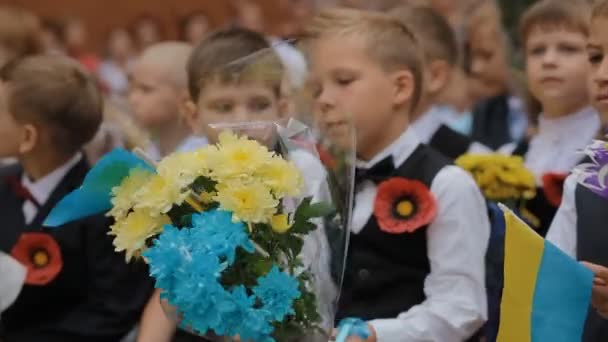 DNEPR, UKRAINE - September 1, 2015 : Ukrainian first former pupils on the celebration of the first day at school. — Stock Video