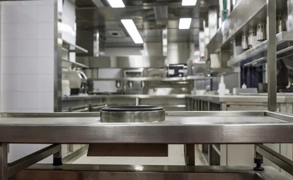 Professional kitchen , view counter in steel . Bokeh . — Stock Photo, Image