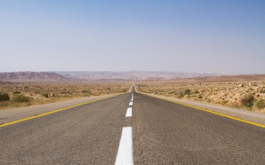 Beautiful road in the desert . clipart