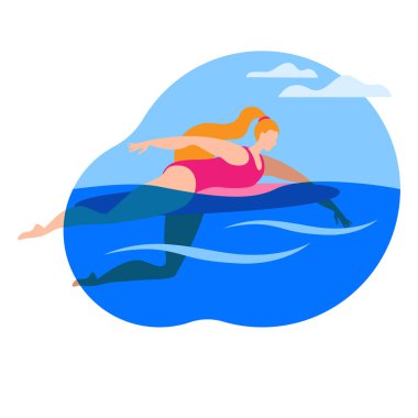 Sörfçü kız sörf tahtasında yüzüyor..