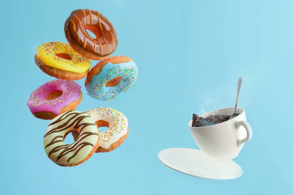 Uçan ve düşen tatlı renkli çörekler ve mavi arka planda beyaz bir fincan kahve. Kahvaltı konsepti.