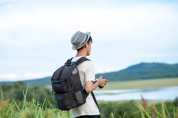 Young Asian Man Traveler Wearing Knitted Hat Backpack Looking Away — Stock Photo, Image