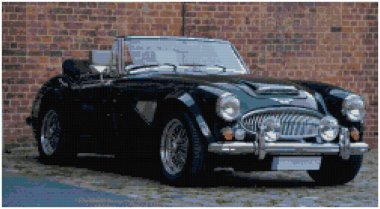 Çatısı olmayan klasik bir araba. Klasik roadster. Çapraz dikiş nakışının resmi. Örülmüş tuval yapının taklidi. Çerçeveli kumaş dekoru, güzel çapraz dikiş, el işlemesi, dikiş.