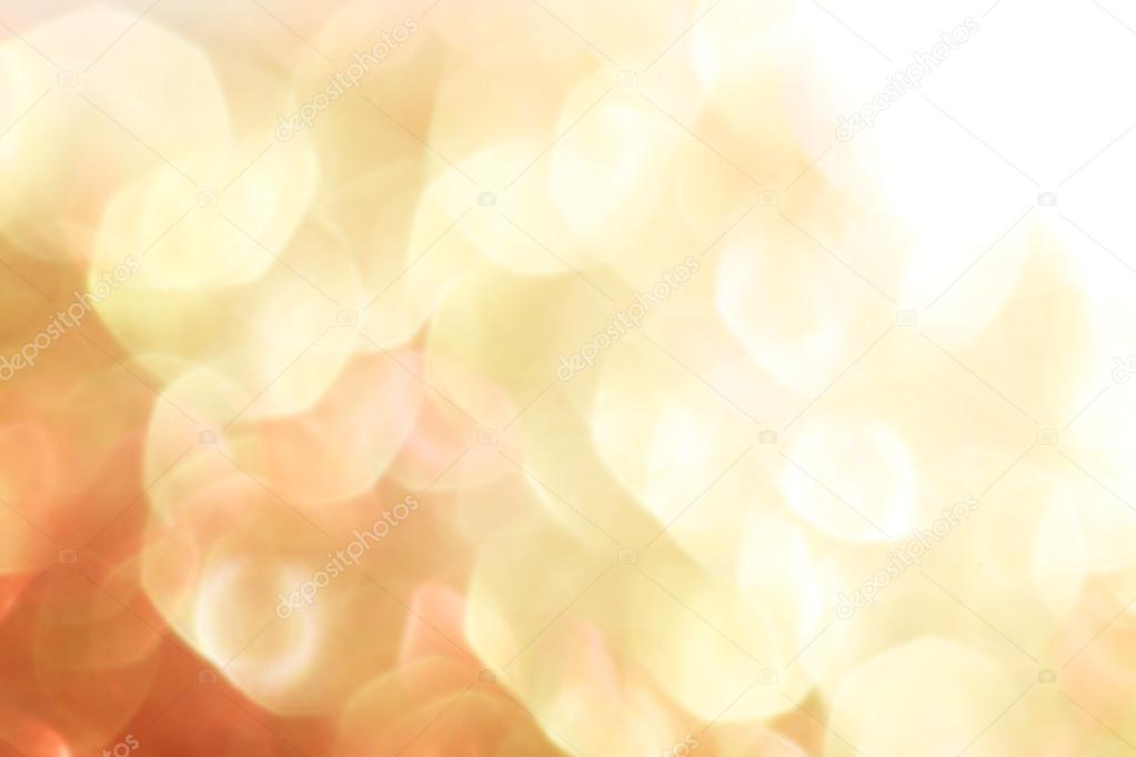 Gold and red abstract bokeh lights, defocused background - soft colors