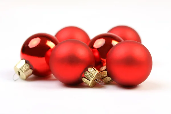 Group of red christmas balls on white background — Stock Photo, Image