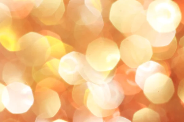 Zlatá, stříbrná, červená, bílá, oranžová abstraktní bokeh světla, rozostřeného pozadí Vánoční pozadí — Stock fotografie