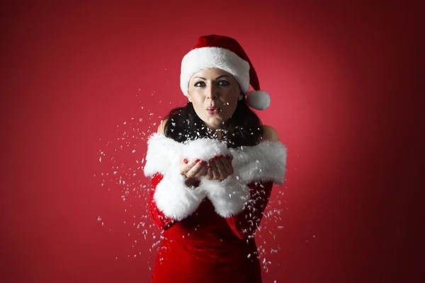 Porträt der schönen sexy Mädchen trägt Weihnachtsmann Kleidung lizenzfreie Stockfotos