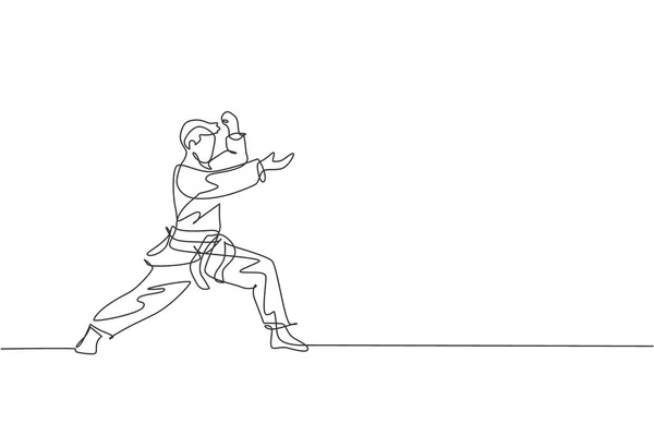 Desenho Linha Contínua Jovem Talentoso Karateka Homem Trem Pose Para — Vetor de Stock