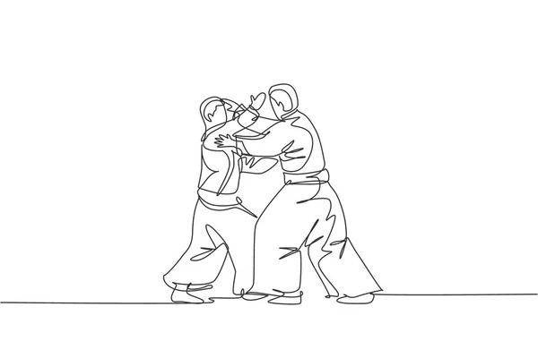 Один Сплошной Рисунок Линии Двух Молодых Спортивных Мужчин Кимоно Практикующих — стоковый вектор