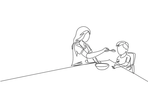 一张年轻妈妈在家里坐在餐椅上喂她生病的发烧儿子的连续线条画 快乐的家庭养育观念 动态单行绘图图形设计矢量插图 — 图库矢量图片