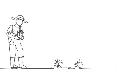 Genç erkek çiftçinin çizdiği tek çizgi tarlalara ekilmek üzere ekin getiriyor. Çiftçilik faaliyetleri minimalist kavram. Modern sürekli çizgi çizimi tasarım grafik vektör çizimi.