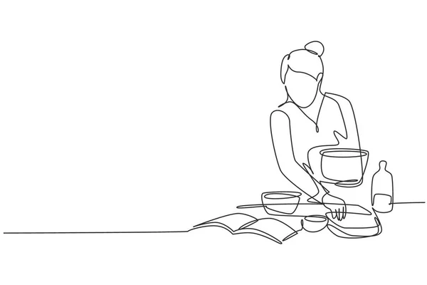 Single One Line Drawing Beautiful Woman Cooking Meal While Reading — Image vectorielle