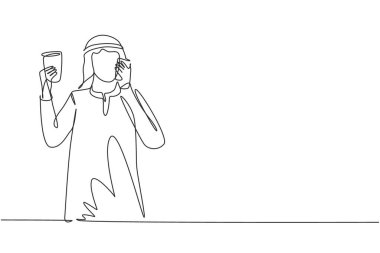 Single continuous line drawing young Arabian man drinking orange juice while making phone call with smartphone and having breakfast at home. Dynamic one line draw graphic design vector illustration