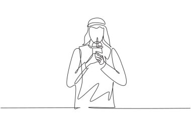 Single continuous line drawing young Arabian male hold plastic cup and drink iced green tea with straw. Make him refreshing in summer season. Dynamic one line draw graphic design vector illustration