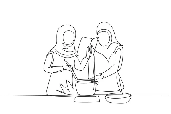 Single Continuous Line Drawing Two Arab Woman Cooking While Reading — Stok Vektör