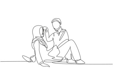 Single continuous line drawing romantic Arabian couple having picnic in park. Relaxing together sitting on the ground and men feeding grapes to women. One line draw graphic design vector illustration