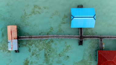 Drone Aerial View of Onok Island, Balabac, Philippines. Tropical Beach, Clear Water, Coral Reefs and Turtles. High quality photo