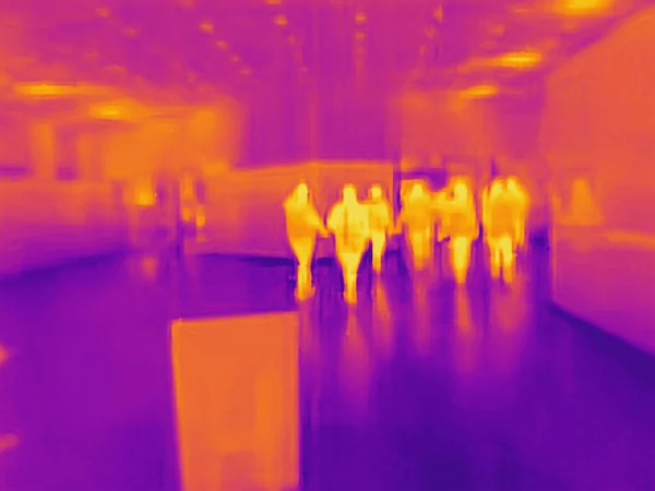 People and covid 19. Real thermal camera image.