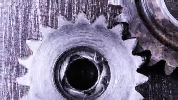 Rotation der Zahnräder auf einem metallischen Hintergrund — Stockvideo