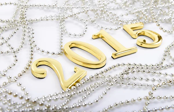 Figure in oro del nuovo anno 2015 su sfondo bianco — Foto Stock