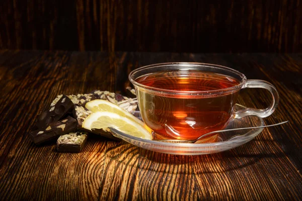 Cup of tea with lemon on wooden background — Stock Photo, Image